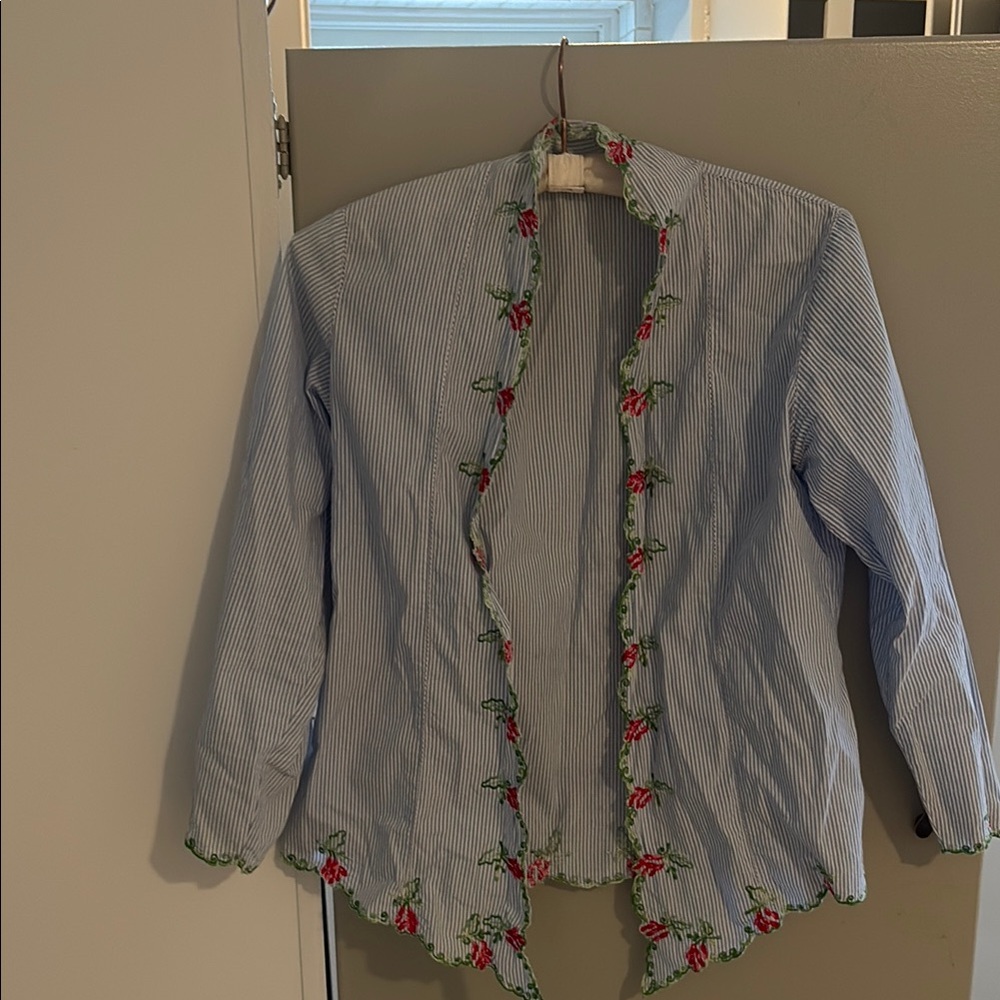 Vintage-Inspired Blue Jacket with Ruffled Detailing
